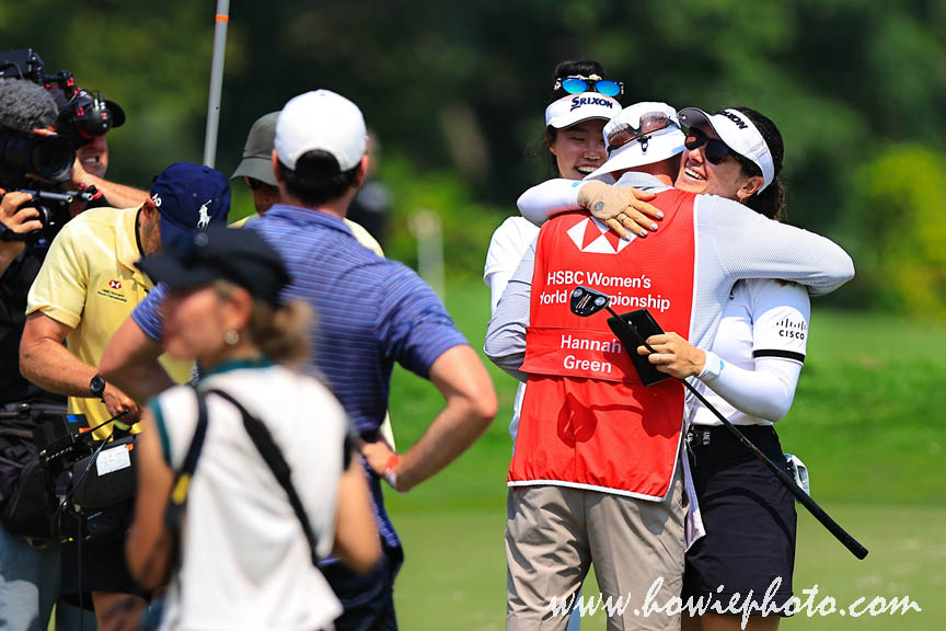 1 March 2026 Hannah Green of Australia embraces husband and caddie, Jarryd Felton, on the 18th green following victory on final day of the HSBC Women's World Championship 2026 at Sentosa Golf Club, Singapore