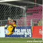 16 June 2013 Goalkeeper of SC Corinthians saves a penalty during the 25th Canon Lion City Cup Final between SC Corinthians and PSV Eindhoven at the Jalan Besar Stadium