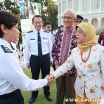 26 June 2019 President Halimah interacts with police officer at Annual Police Dinner at Istana