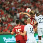 15 July 2022 Roberto Firmino of Liverpool looks on while Joachim Andersen of Crystal Palace heads the ball during the Standard Chartered Singapore Trophy 2022 match between Liverpool and Crystal Palace at the Singapore National Stadium