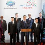 15 Nov 2009 PM Lee Hsien Loong speaks beside other countries' heads of state during the Closing Ceremony of APEC Singapore 2009