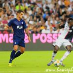 21 JULY 2019 Blaise Matuidi (R) of Juventus and Erik Lamela of Tottemham Hotspur (C) fight for ball during the 2019 International Champions Cup Singapore match between Juventus and Tottenham Hotspur at the Singapore National Stadium